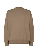 A product shot of the Homme Plisse Issey Miyake HP CASHMERE top in .