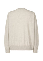 A detail shot of the Homme Plisse Issey Miyake HP CASHMERE top.