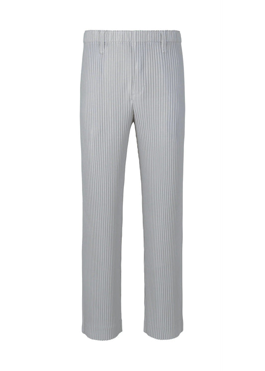 A product shot of the HOMME PLISSÉ ISSEY MIYAKE BASICS trousers in light gray.