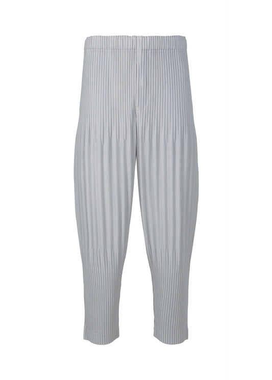 A product shot of the HOMME PLISSÉ ISSEY MIYAKE BASICS trousers in light gray.