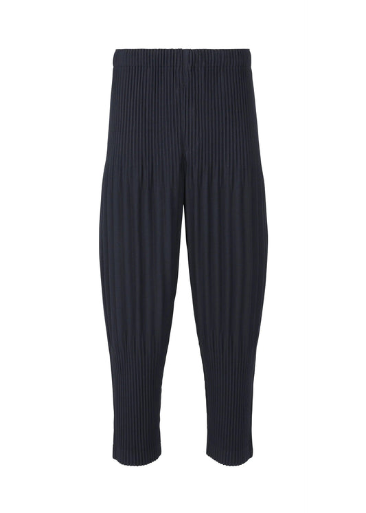 A product shot of the HOMME PLISSÉ ISSEY MIYAKE BASICS trousers in navy.
