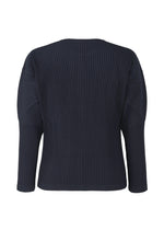 A detail shot of the HOMME PLISSÉ ISSEY MIYAKE BASICS shirt.
