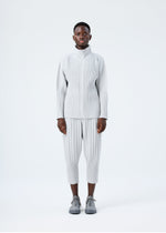A model wears the HOMME PLISSÉ ISSEY MIYAKE BASICS basics-zipup-cardigan-navy-2.