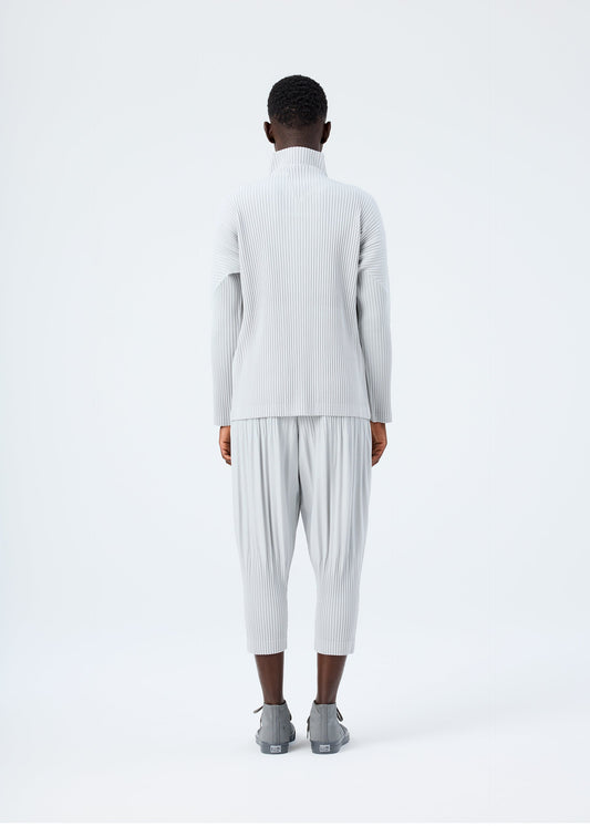 A model wears the HOMME PLISSÉ ISSEY MIYAKE BASICS basics-zipup-cardigan-light-grey.
