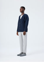 A model wears the HOMME PLISSÉ ISSEY MIYAKE BASICS basics-cardigan-light-grey-fw26.