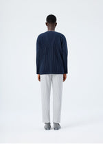 A model wears the HOMME PLISSÉ ISSEY MIYAKE BASICS basics-cardigan-light-grey-fw26.