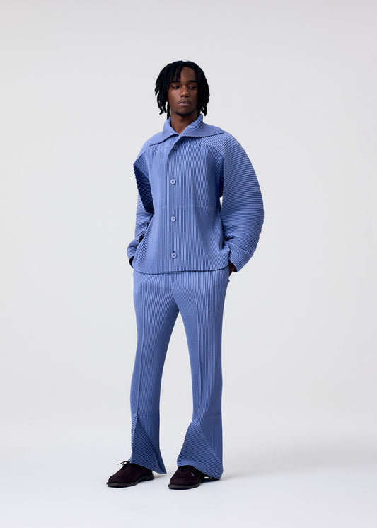 A model wears the Homme Plisse Issey Miyake LINEN LIKE jacket.