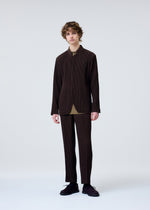 A model wears the Homme Plisse Issey Miyake TUXEDO PLEATS prêt à porter.