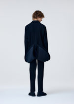 A model wears the Homme Plisse Issey Miyake TUXEDO PLEATS prêt à porter.