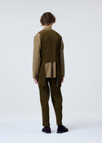 A model wears the Homme Plisse Issey Miyake TUXEDO PLEATS prêt à porter.