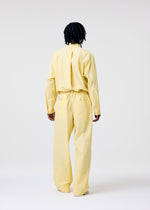 A model wears the Homme Plisse Issey Miyake FRESHEN jumpsuit.