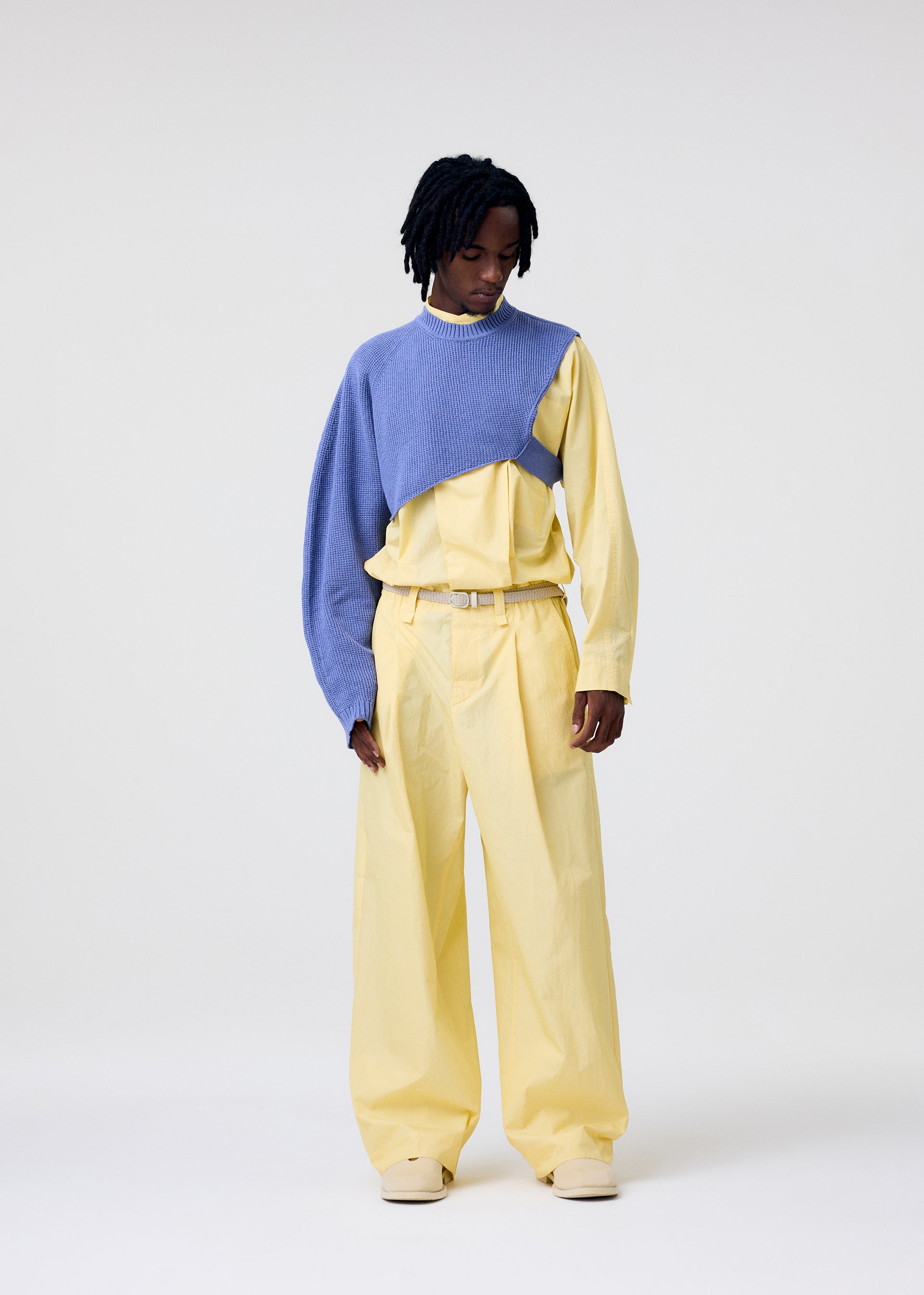 A model wears the Homme Plisse Issey Miyake FRESHEN jumpsuit.