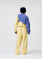 A model wears the Homme Plisse Issey Miyake FRESHEN jumpsuit.