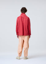 A model wears the HOMME PLISSE ISSEY MIYAKE STREAMLINE SHIRT prêt à porter.