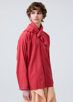 A model wears the HOMME PLISSE ISSEY MIYAKE STREAMLINE SHIRT prêt à porter.