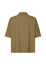 A detail shot of the Homme Plisse Issey Miyake EMBROIDERY PRESS SHIRT prêt à porter.