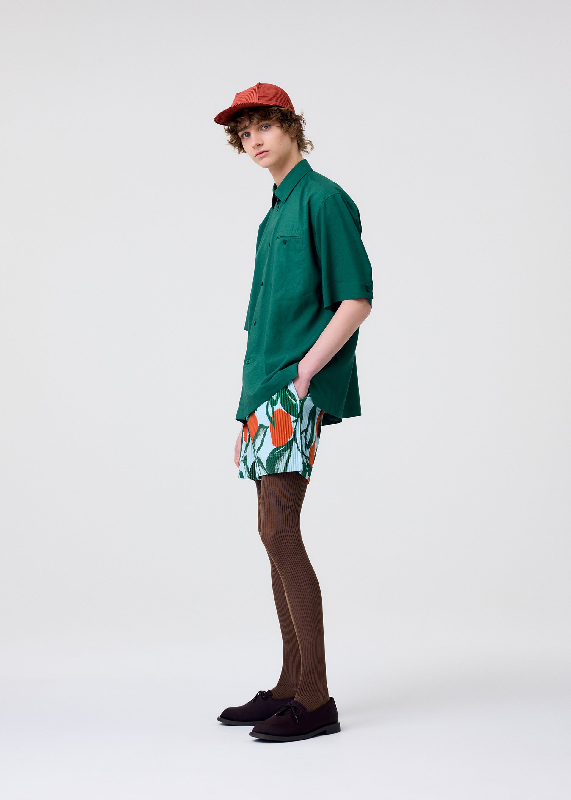A model wears the Homme Plisse Issey Miyake PL RAMIE SHIRT shirt.