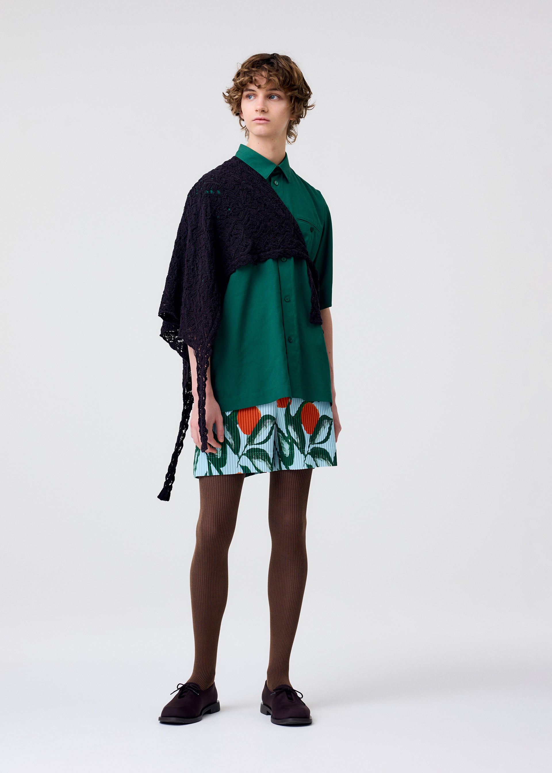 A model wears the Homme Plisse Issey Miyake PL RAMIE SHIRT shirt.