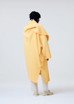 A model wears the Homme Plisse Issey Miyake WEAR OR WRAP prêt à porter.