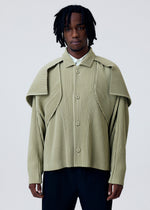 A model wears the HOMME PLISSE ISSEY MIYAKE COVER AND FOLD prêt à porter.