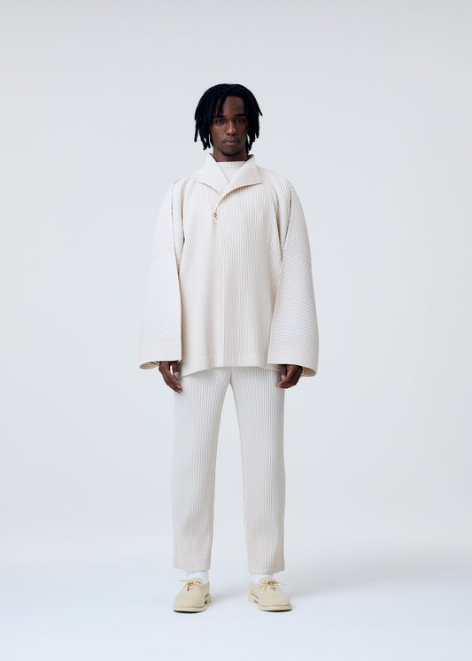 A model wears the Homme Plisse Issey Miyake WEAR OR WRAP prêt à porter.