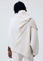 A model wears the Homme Plisse Issey Miyake WEAR OR WRAP prêt à porter.