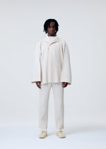 A model wears the Homme Plisse Issey Miyake MONTHLY COLORS MARCH prêt à porter.