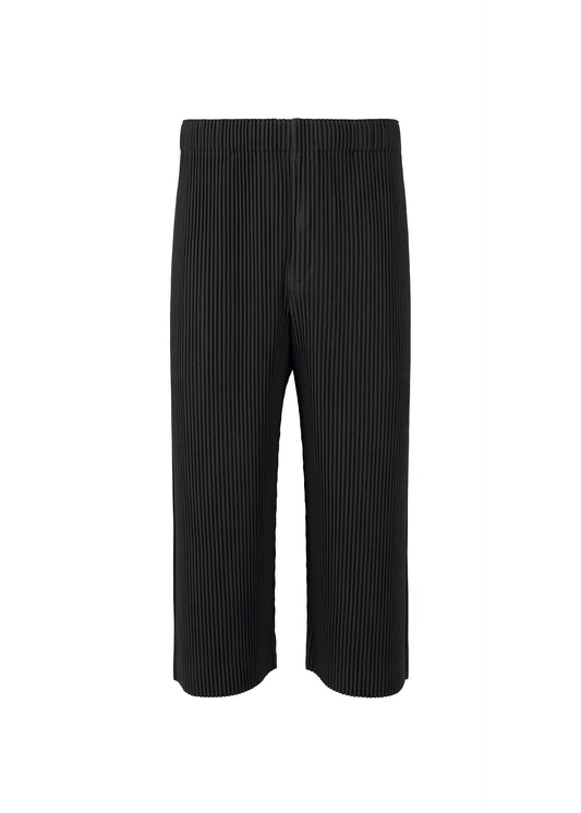 A product shot of the Homme Plisse Issey Miyake MONTHLY COLORS MAY trousers in black (15), recurring_style.