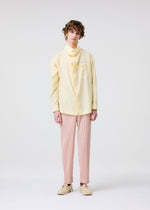 A model wears the Homme Plisse Issey Miyake COLOR PLEATS 2 trousers.
