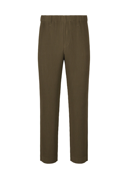 A product shot of the HOMME PLISSÉ ISSEY MIYAKE TAILORED PLEATS 3 trousers in genova metal ocher.