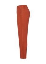 A detail shot of the HOMME PLISSÉ ISSEY MIYAKE TAILORED PLEATS 3 trousers.