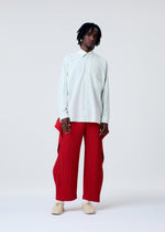 A model wears the HOMME PLISSE ISSEY MIYAKE COVER AND FOLD prêt à porter.