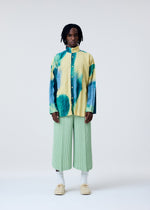 A model wears the Homme Plisse Issey Miyake PLEATS BOTTOMS 2 pants.