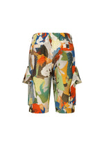 A detail shot of the HOMME PLISSÉ ISSEY MIYAKE PALETTE MARBLED trousers.