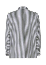 A detail shot of the Homme Plisse Issey Miyake STRIPE JERSEY shirt.