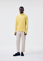 A model wears the Homme Plisse Issey Miyake MONTHLY COLORS MARCH prêt à porter.