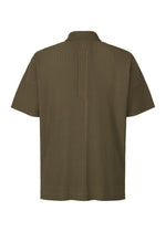 A detail shot of the HOMME PLISSÉ ISSEY MIYAKE MONTHLY COLORS : JUNE polo shirt.
