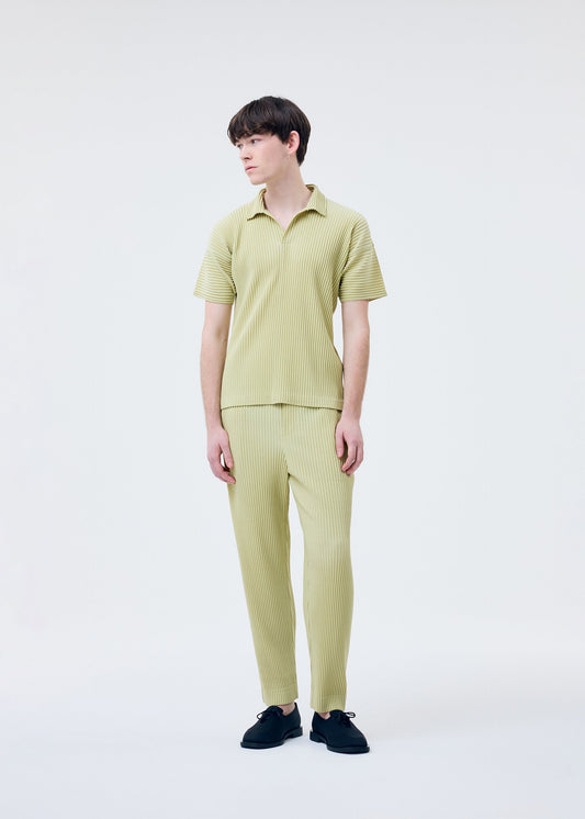 A model wears the Homme Plisse Issey Miyake COLOR PLEATS 2 shirt.