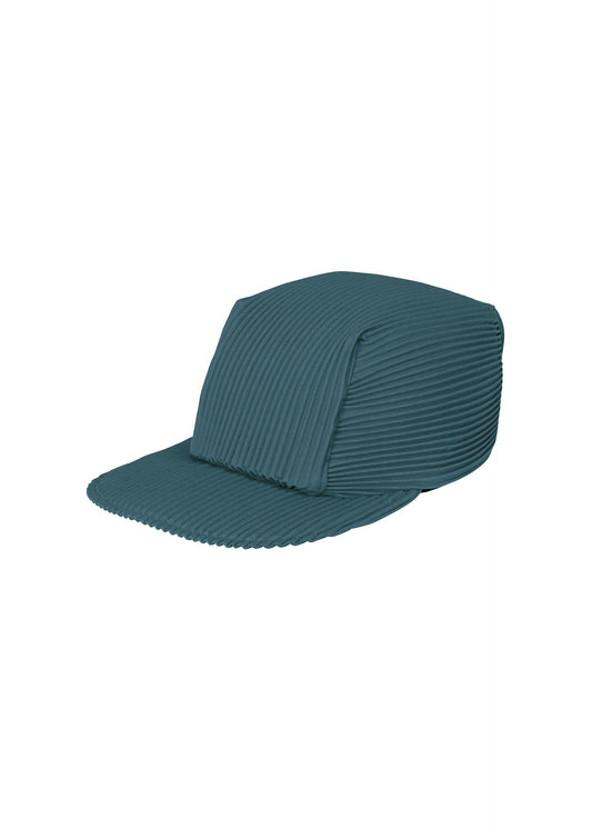 A product shot of the HOMME PLISSÉ ISSEY MIYAKE PLEATS CAP cap in shadow blue.