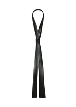 A product shot of the HOMME PLISSÉ ISSEY MIYAKE IN THE SHADOW PLEATS TIE tie in shadow black.