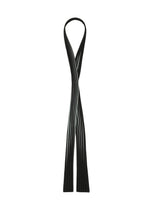 A detail shot of the HOMME PLISSÉ ISSEY MIYAKE IN THE SHADOW PLEATS TIE tie.