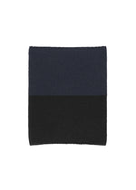 A product shot of the HOMME PLISSÉ ISSEY MIYAKE WINTER GEAR : COLOR BLOCK scarf in navy.