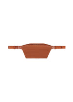 A product shot of the HOMME PLISSÉ ISSEY MIYAKE PLEATS SLIM BAG bag in shade vermillion.