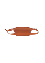 A detail shot of the HOMME PLISSÉ ISSEY MIYAKE PLEATS SLIM BAG bag.