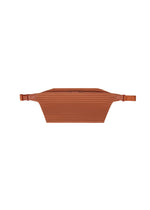 A product shot of the HOMME PLISSÉ ISSEY MIYAKE PLEATS SLIM BAG bag in shade vermillion.