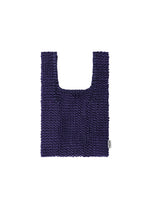 A product shot of the HOMME PLISSÉ ISSEY MIYAKE MESH PLEATS BAG bag in blue.