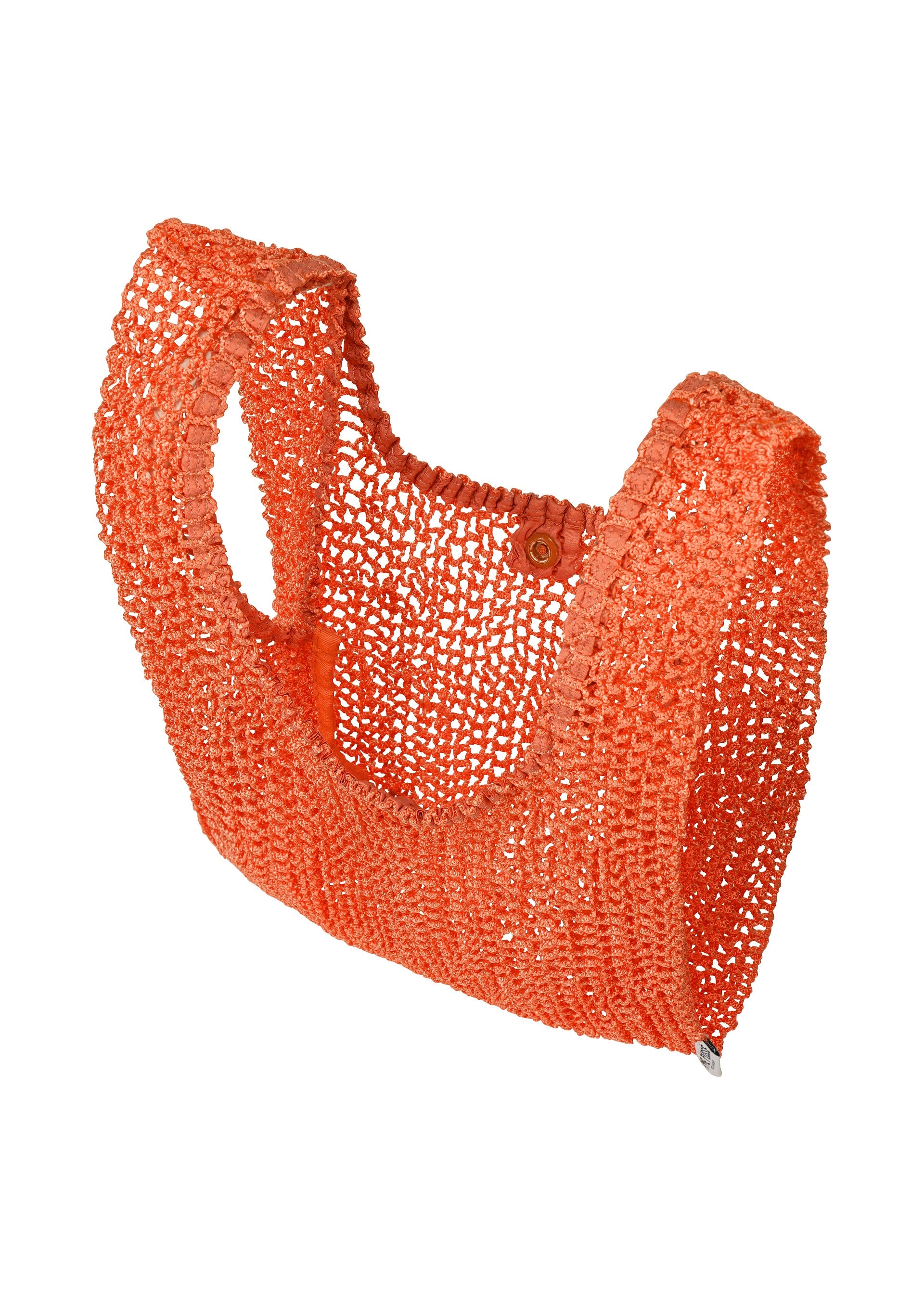A detail shot of the HOMME PLISSÉ ISSEY MIYAKE MESH PLEATS BAG bag.