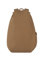 A product shot of the HOMME PLISSÉ ISSEY MIYAKE PLEATS BACKPACK bag in khaki.