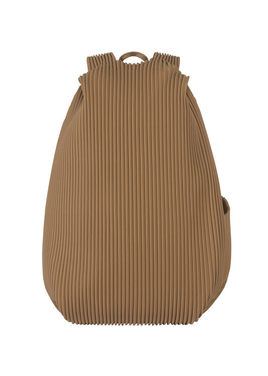 A product shot of the HOMME PLISSÉ ISSEY MIYAKE PLEATS BACKPACK bag in khaki.