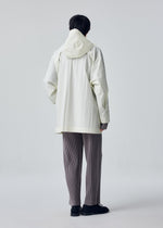 A model wears the HOMME PLISSÉ ISSEY MIYAKE SLIT COAT blouson.